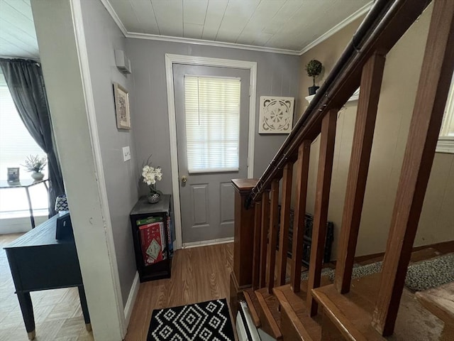 104 Temple St, Gardner, MA 01440 - entrance foyer featuring stairs, ornamental molding, wood finished floors, and baseboards