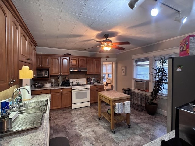 kitchen featuring white range with gas cooktop, ornamental molding, ceiling fan, sink, and backsplash