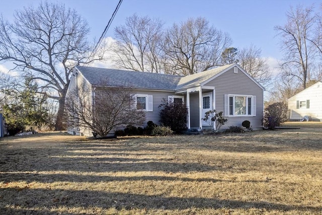 view of front of home with a front yard