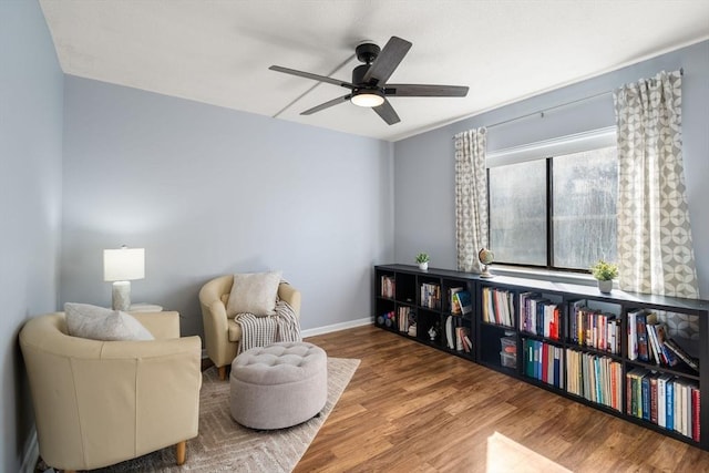10 Williams St Unit 45, Watertown, MA 02472 - sitting room featuring baseboards, a ceiling fan, and wood finished floors