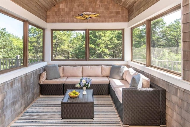 sunroom with lofted ceiling