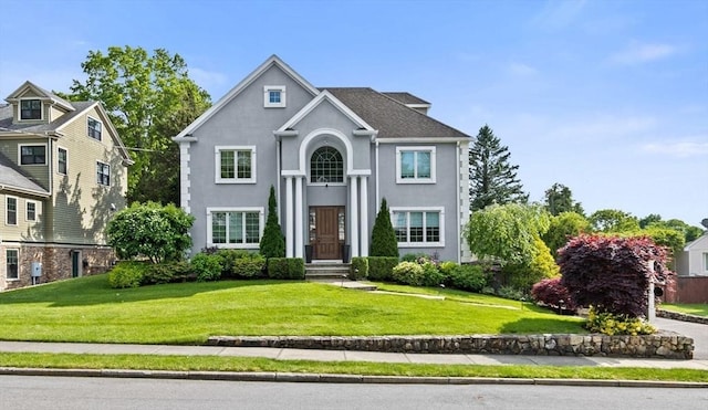 front of property featuring a front lawn