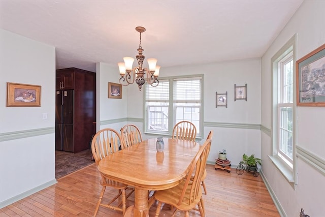 11 Azalea Ln Unit 11, Marlborough, MA 01752 - dining space with a chandelier, light wood-style flooring, and plenty of natural light