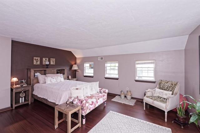 11 Azalea Ln Unit 11, Marlborough, MA 01752 - bedroom featuring wood finished floors, vaulted ceiling, and a textured ceiling