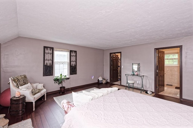 11 Azalea Ln Unit 11, Marlborough, MA 01752 - bedroom with hardwood / wood-style flooring, a textured ceiling, and ensuite bath