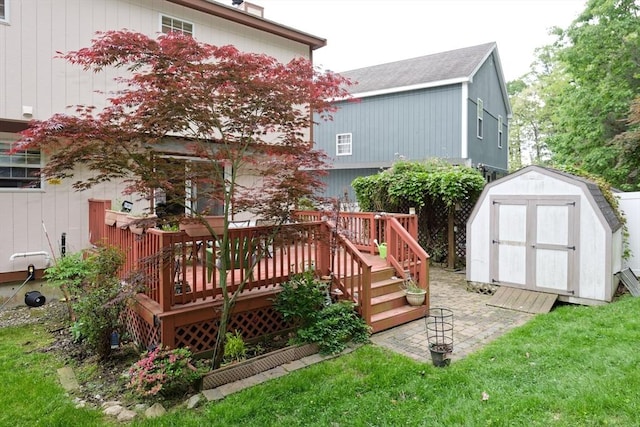 11 Azalea Ln Unit 11, Marlborough, MA 01752 - back of house featuring a shed, a deck, and a lawn