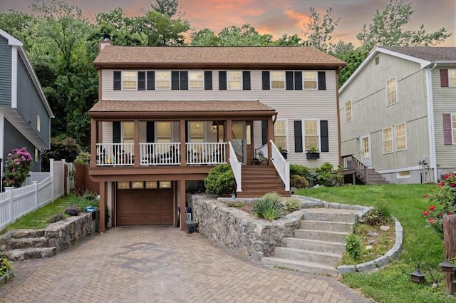11 Azalea Ln Unit 11, Marlborough, MA 01752 - view of front of home featuring stairway, decorative driveway, a chimney, a garage, and a porch