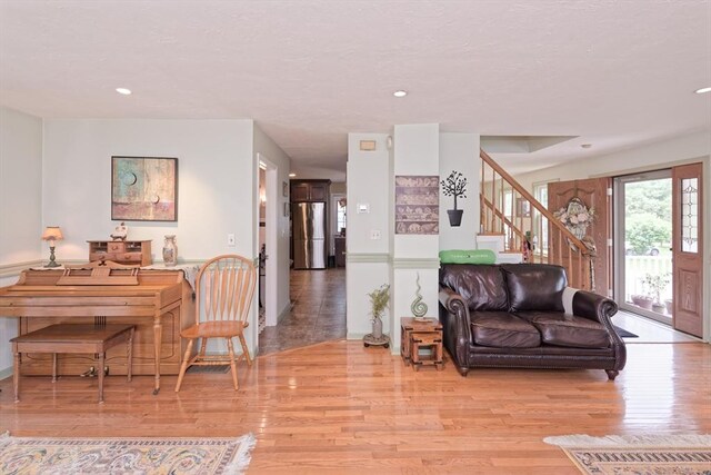 11 Azalea Ln Unit 11, Marlborough, MA 01752 - living area featuring wood finished floors, stairs, and recessed lighting