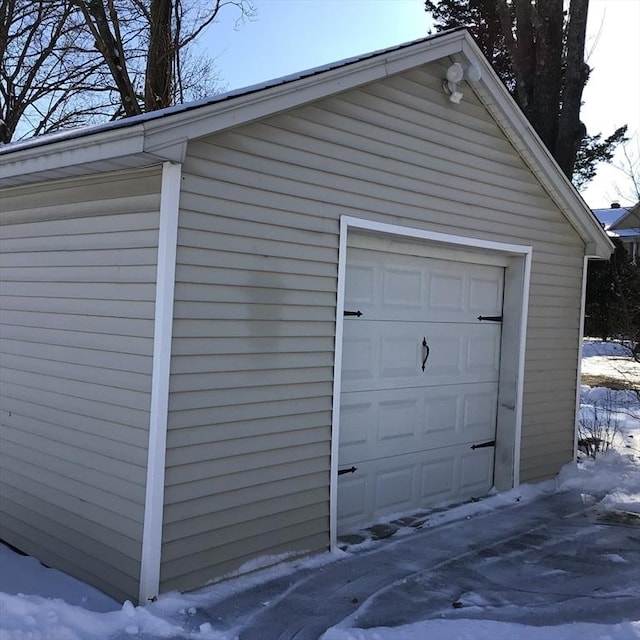 view of snow covered garage