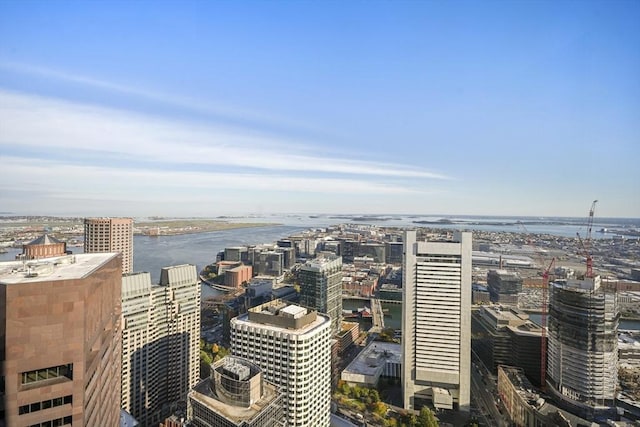 property's view of city with a water view