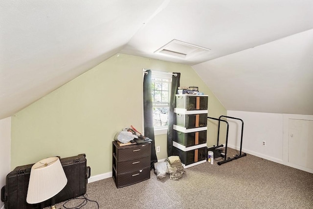 bonus room with vaulted ceiling, carpet flooring, attic access, and baseboards