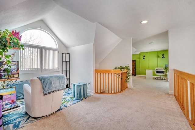 sitting room with baseboards, carpet, recessed lighting, and lofted ceiling