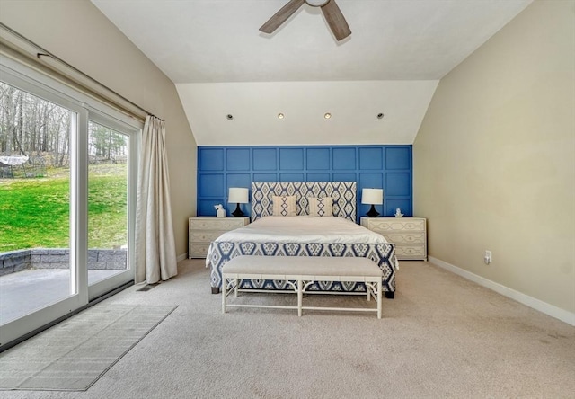 bedroom with vaulted ceiling, baseboards, light colored carpet, and access to exterior