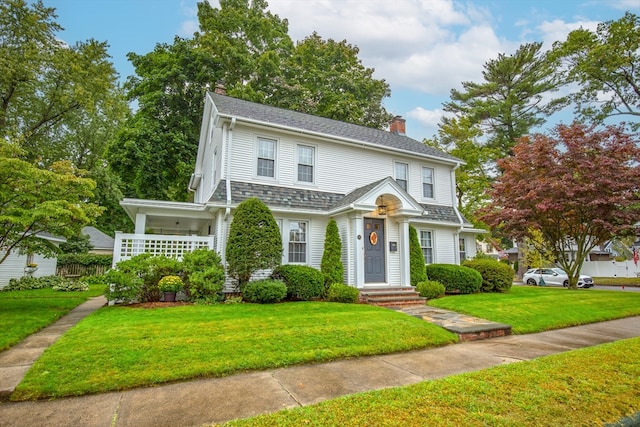 view of front of house with a front yard