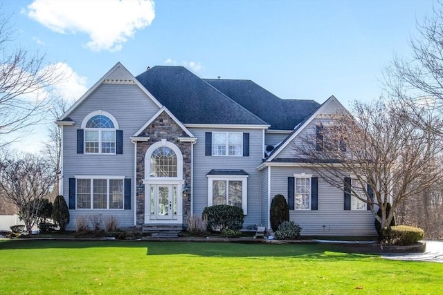 view of front of home with a front yard