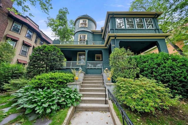 179 Rawson Unit 2, Brookline, MA 02445 - victorian house featuring covered porch and stairway