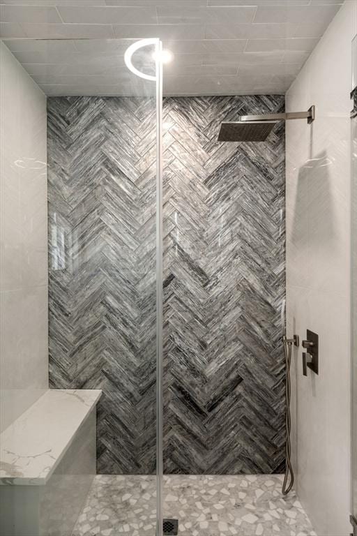 bathroom featuring a shower stall