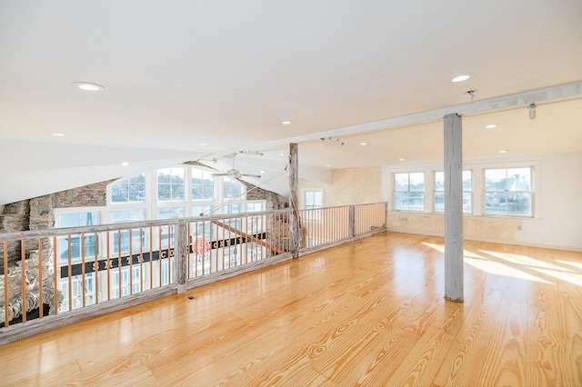 additional living space featuring recessed lighting, ceiling fan, wood finished floors, and vaulted ceiling