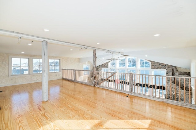 bonus room featuring wood finished floors, a ceiling fan, vaulted ceiling, and recessed lighting