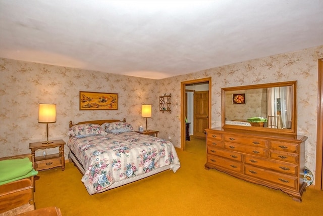 bedroom featuring light colored carpet