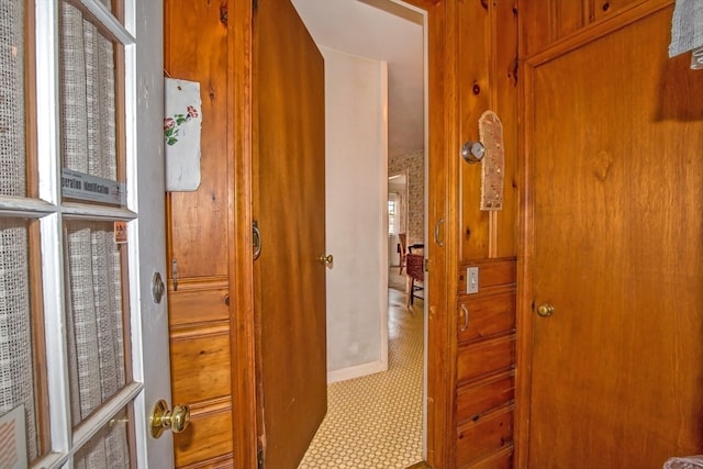 corridor with tile patterned floors