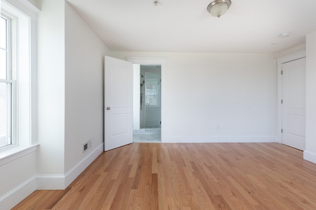 empty room with light wood-type flooring