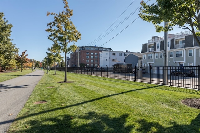 view of home's community with a lawn