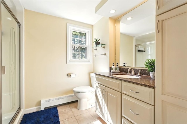 bathroom featuring tile patterned flooring, baseboard heating, a stall shower, and toilet