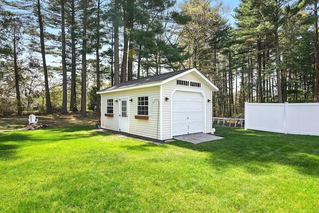 garage featuring fence