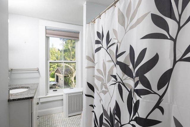full bath with vanity, tile patterned floors, and a shower with curtain