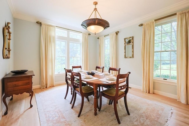 83 High Ridge Rd, Boxford, MA 01921 - dining room with healthy amount of natural light, light wood finished floors, and crown molding