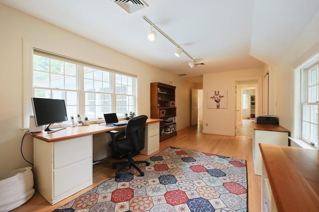 83 High Ridge Rd, Boxford, MA 01921 - office area with light wood-style floors and track lighting