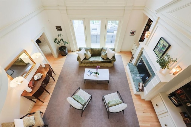 83 High Ridge Rd, Boxford, MA 01921 - living area featuring light wood-style floors and a premium fireplace