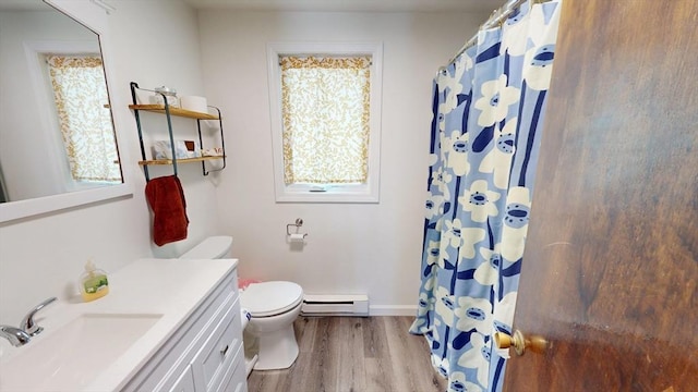 full bath featuring baseboard heating, healthy amount of natural light, wood finished floors, and toilet