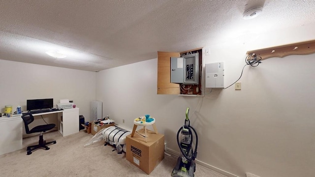 home office featuring a textured ceiling, electric panel, and light carpet