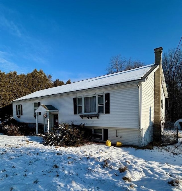 view of snow covered property