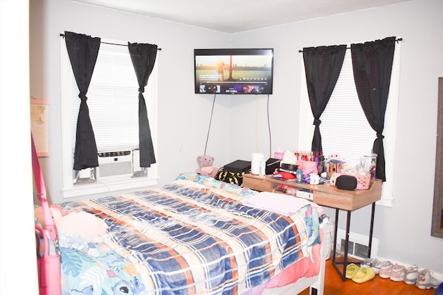 bedroom featuring hardwood / wood-style flooring