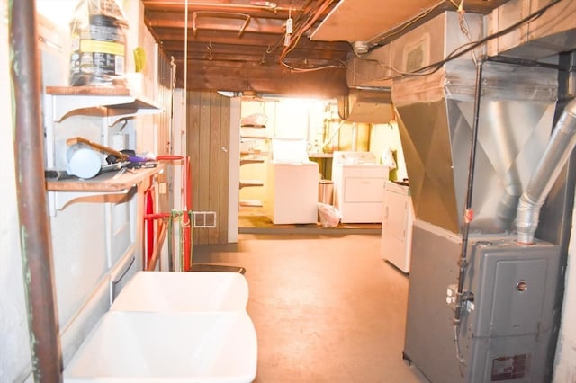 basement with separate washer and dryer