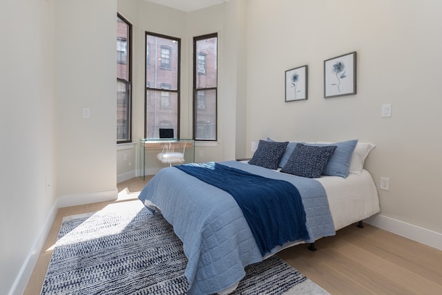 bedroom featuring light hardwood / wood-style floors