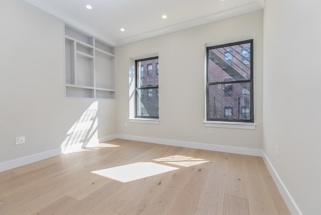 unfurnished room featuring light hardwood / wood-style flooring