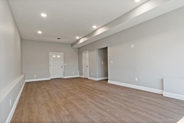 unfurnished room featuring light hardwood / wood-style flooring