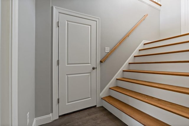 stairs with wood-type flooring