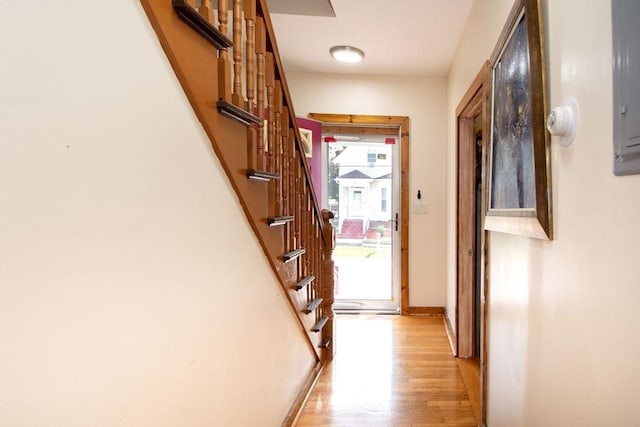 18 Morton St, Brockton, MA 02301 - corridor featuring light wood-type flooring and stairway
