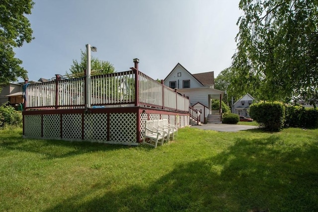 18 Morton St, Brockton, MA 02301 - rear view of house featuring a lawn, a deck, and stairway