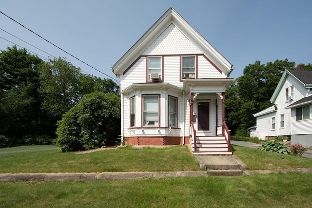 18 Morton St, Brockton, MA 02301 - victorian home with a front lawn and cooling unit