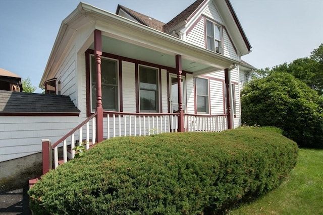 18 Morton St, Brockton, MA 02301 - view of side of home featuring a porch