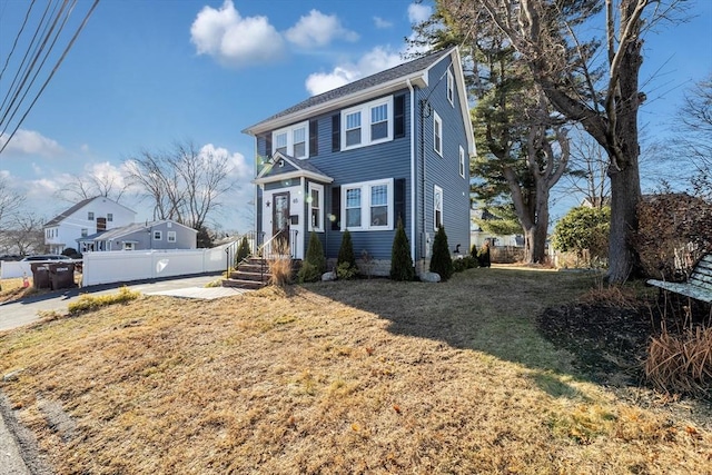 view of front facade with a front yard