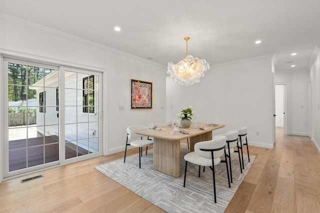 1 Cole Rd, Wayland, MA 01778 - dining area featuring light wood finished floors, crown molding, a chandelier, baseboards, and recessed lighting