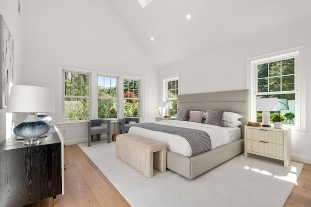 1 Cole Rd, Wayland, MA 01778 - bedroom featuring light wood-style flooring, high vaulted ceiling, recessed lighting, and baseboards