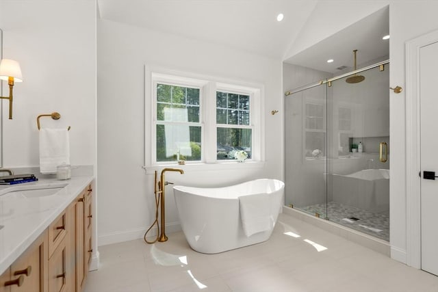 1 Cole Rd, Wayland, MA 01778 - full bathroom featuring a stall shower, vanity, a soaking tub, lofted ceiling, and recessed lighting